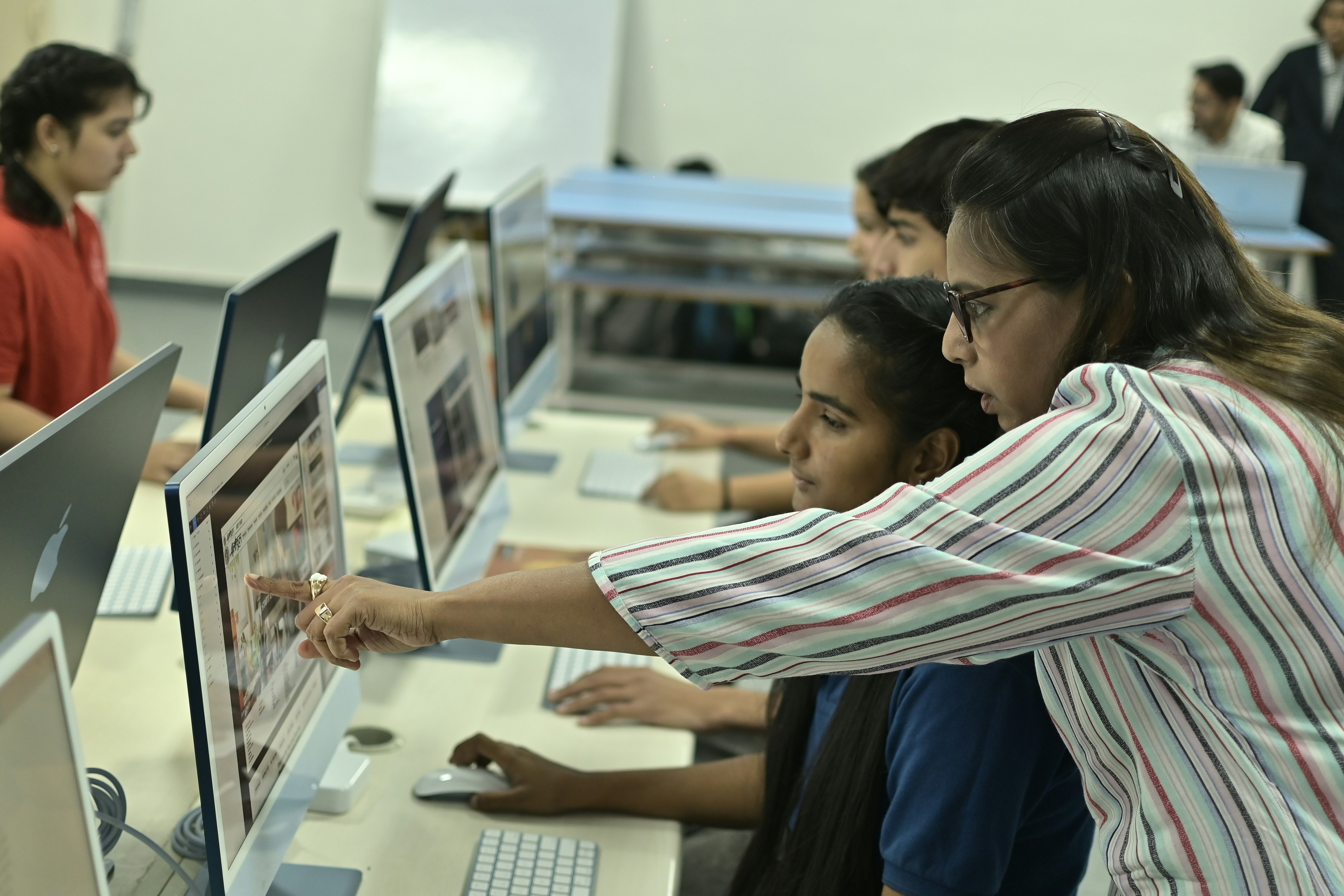 PrimoWork team helping people learn digital skills